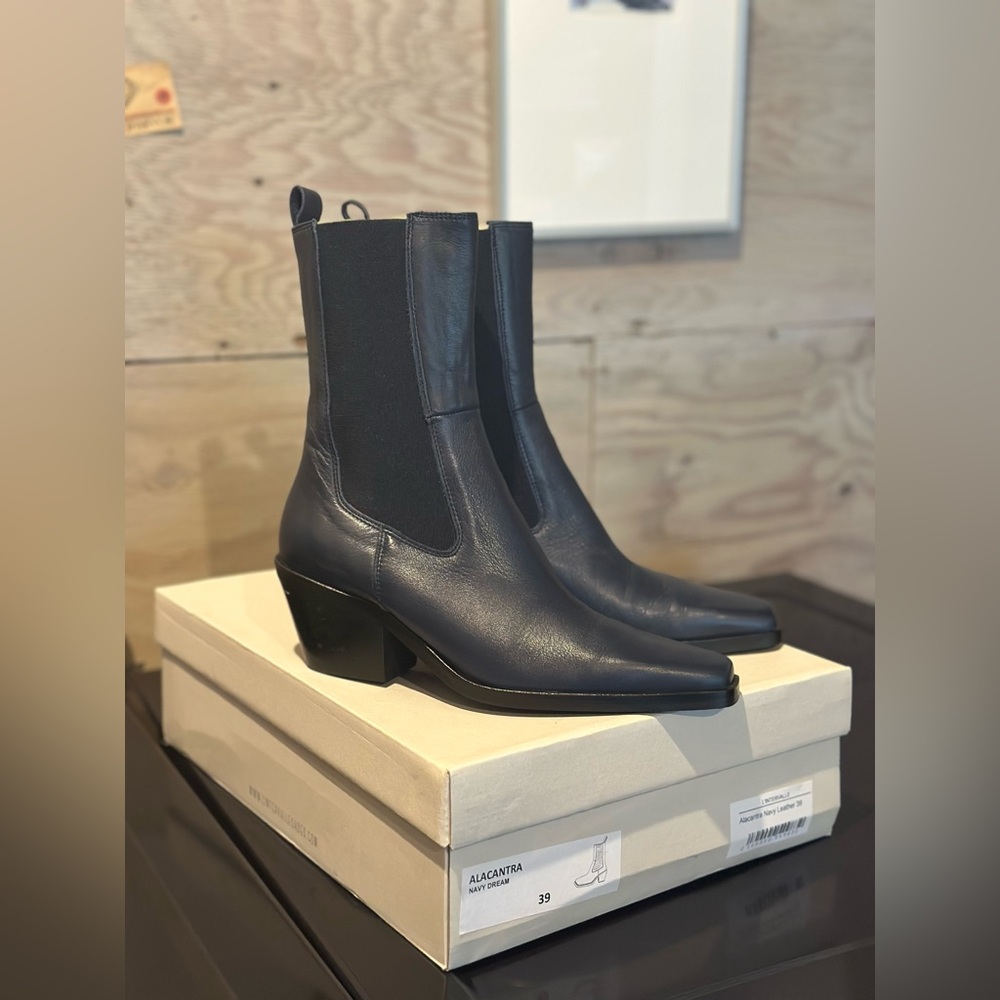Navy ankle boots (part cowboy, part Chelsea boot, with a square toe)